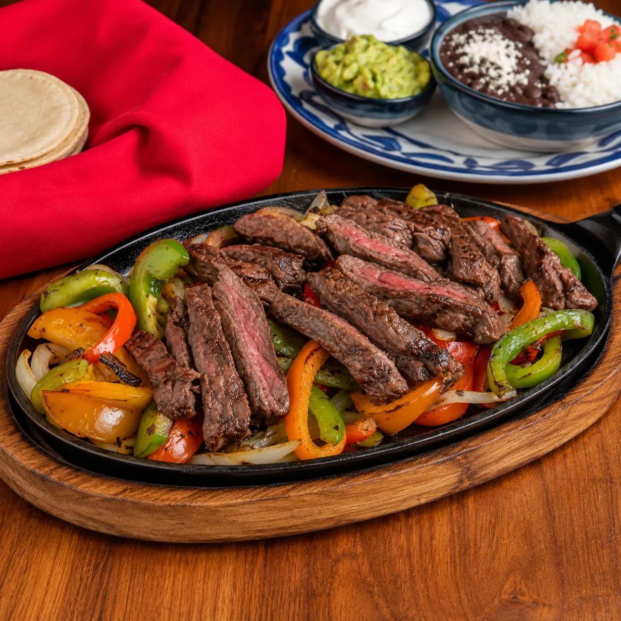 Popular item de Latin on Ocean Drive: STEAK FAJITAS