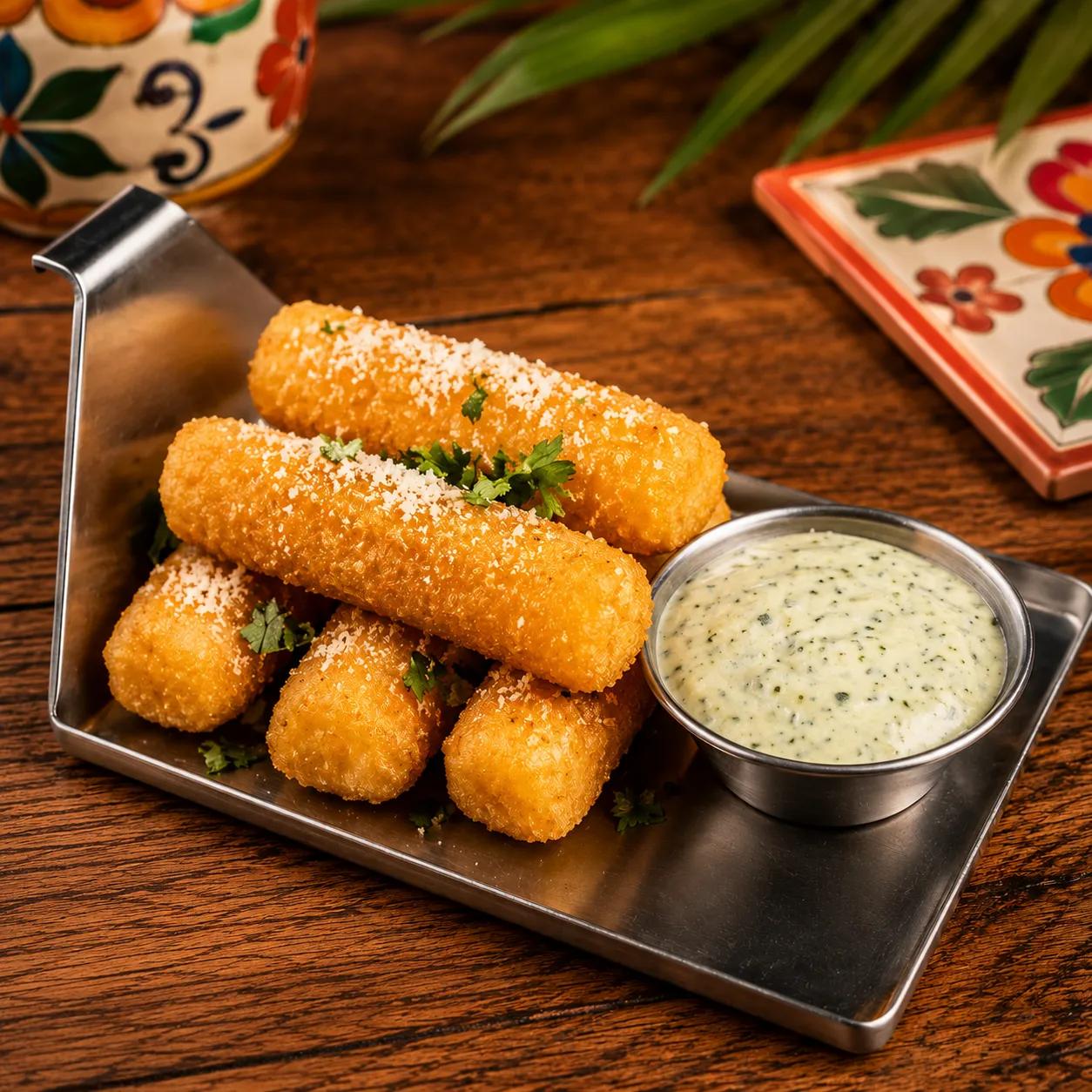 Popular item de Latin on Ocean Drive: TRUFFLE YUCA FRIES